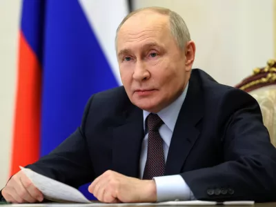 FILE - Russian President Vladimir Putin holds a videoconference cabinet meeting at the Kremlin in Moscow, Thursday, April 23, 2026. (Alexander Kazakov/Sputnik, Kremlin Pool Photo via AP, File)