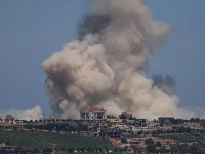 Smoke rises in Lebanon after an explosion, as seen from the Israeli side of the Israel-Lebanon border, in northern Israel, April 25, 2026. REUTERS/Florion Goga
