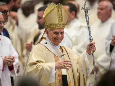 Pope Leo XIV leaves after presiding over Sunday Mass in St. Peter's Basilica at the Vatican during which he made ten new priests, Sunday, April 26, 2026. (AP Photo/Alessandra Tarantino)