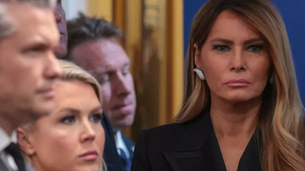First lady Melania Trump looks on next to White House Press Secretary Karoline Leavitt and U.S. Secretary of Defense Pete Hegseth as U.S. President Donald Trump holds a press briefing at the White House, following a shooting incident during the annual White House Correspondents' Association dinner, in Washington, D.C., U.S., April 25, 2026 REUTERS/Jonathan Ernst   TPX IMAGES OF THE DAY