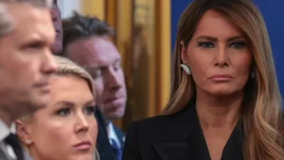 First lady Melania Trump looks on next to White House Press Secretary Karoline Leavitt and U.S. Secretary of Defense Pete Hegseth as U.S. President Donald Trump holds a press briefing at the White House, following a shooting incident during the annual White House Correspondents' Association dinner, in Washington, D.C., U.S., April 25, 2026 REUTERS/Jonathan Ernst   TPX IMAGES OF THE DAY
