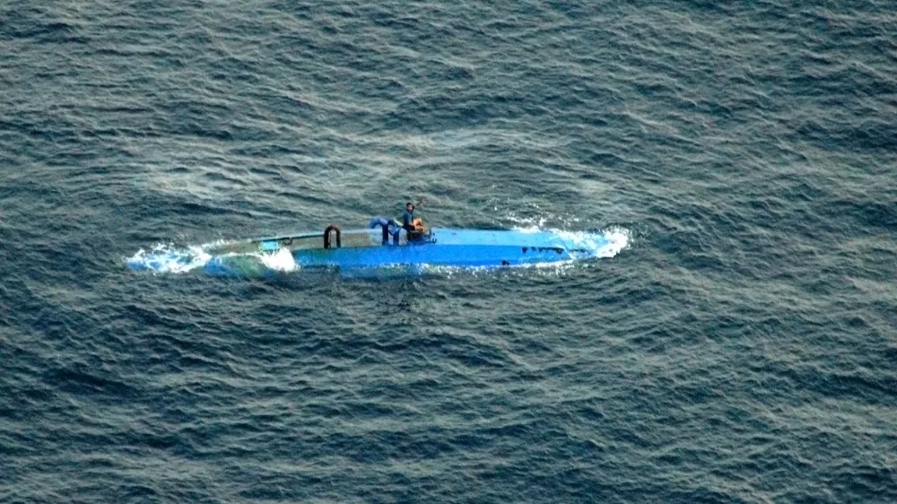 This image provided by the US Navy shows a self-propelled semi-submersible vessel off the coast of Central America in the eastern Pacific, Sunday, Aug 19. 2007. Coast Guard officials intercepted the vessel and detained the smugglers, who were transporting approximately 5.5 tons of cocaine worth $352 million. (AP Photo/US Navy)