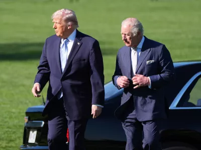 President Donald Trump and Britain's King Charles III arrive to look at the White House garden and bee hive on the South Lawn of the White House, Monday, April 27, 2026, in Washington. (AP Photo/Alex Brandon, Pool)