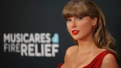 FILE PHOTO: Taylor Swift poses at the red carpet during the 67th Annual Grammy Awards in Los Angeles, California, U.S., February 2, 2025. REUTERS/Daniel Cole/File Photo