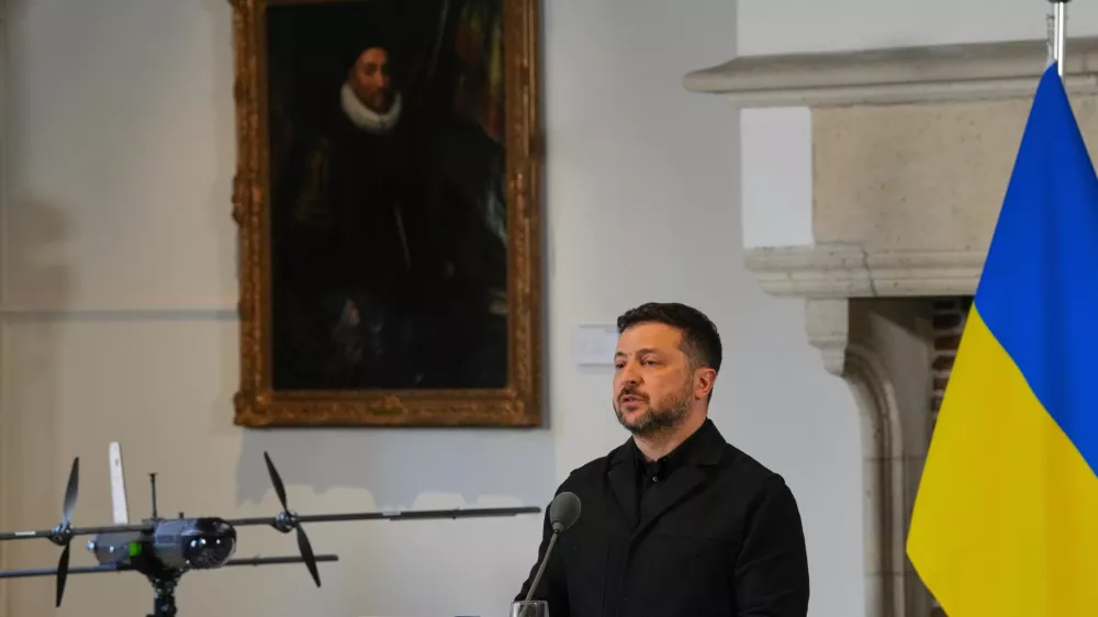 Ukraine's President Volodymyr Zelenskyy speaks next to a drone after he received the International Four Freedoms Award, in Middelburg, Netherlands, Thursday, April 16, 2026. (AP Photo/Peter Dejong)