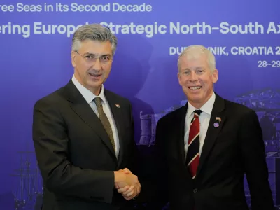 Croatian Prime Minister Andrej Plenkovic, left, welcomes U.S. Secretary of Energy Chris Wright at the Three Seas Summit in Dubrovnik, Croatia, Tuesday, April 28, 2026. (AP Photo/Darko Bandic)