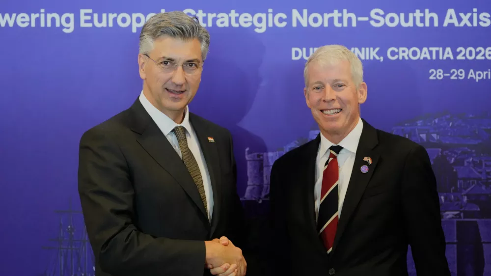 Croatian Prime Minister Andrej Plenkovic, left, welcomes U.S. Secretary of Energy Chris Wright at the Three Seas Summit in Dubrovnik, Croatia, Tuesday, April 28, 2026. (AP Photo/Darko Bandic)