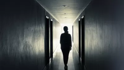 Women are walking alone in the dark.Light at the end of the tunnel concept / Foto: Tapui