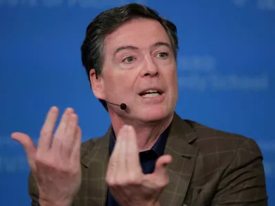 FILE - Former Director of the Federal Bureau of Investigation James Comey at Harvard University's Institute of Politics' JFK Jr. Forum in Cambridge, Mass., Feb. 24, 2020. (AP Photo/Charles Krupa, File)