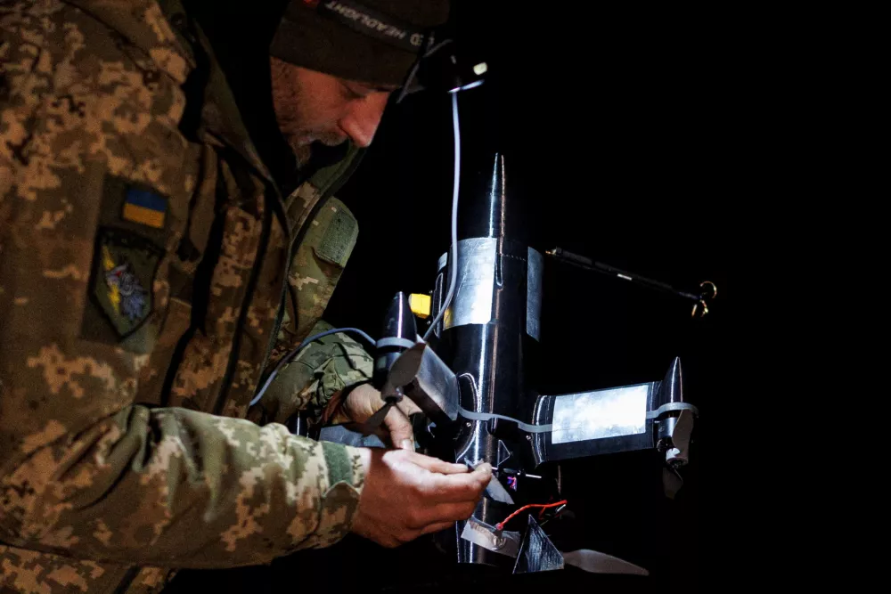 FILE PHOTO: Yuriy, a service member of an air defence unit of the 420th Khort Separate Unmanned Systems Battalion prepares a P1-Sun FPV interceptor drone for a launch during his combat shift, amid Russia's attack on Ukraine, in Kharkiv region, Ukraine March 18, 2026. REUTERS/Valentyn Ogirenko/File Photo