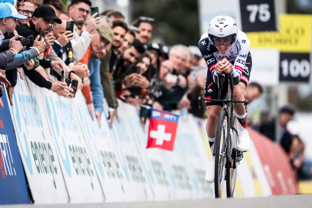 Tadej Pogacar from Slovenia of UAE Team Emirates XRG in action during the prologue, a 3,2 km race against the clock at the 79th Tour de Romandie UCI World Tour Cycling race, in Villars-sur-Glane, Switzerland, Tuesday, April 28, 2026. (Laurent Gillieron/Keystone via AP)