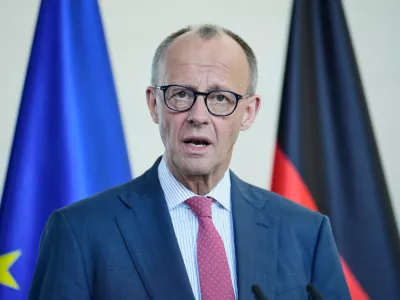 German Chancellor Friedrich Merz speaks during a joint press conference with Federal Minister of Health Nina Warken after the cabinet meeting at the chancellery in Berlin, Germany, Wednesday, April 29, 2026. (AP Photo/Ebrahim Noroozi)
