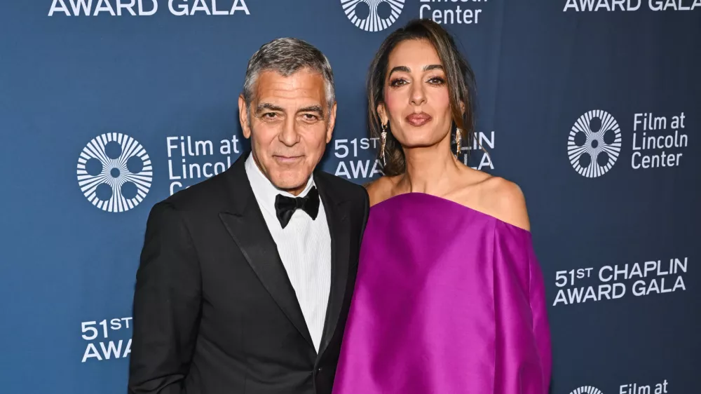 George Clooney, left, and Amal Clooney attend the 51st annual Chaplin Award Gala, honoring George Clooney, at Alice Tully Hall on Monday, April 27, 2026, in New York. (Photo by Evan Agostini/Invision/AP)