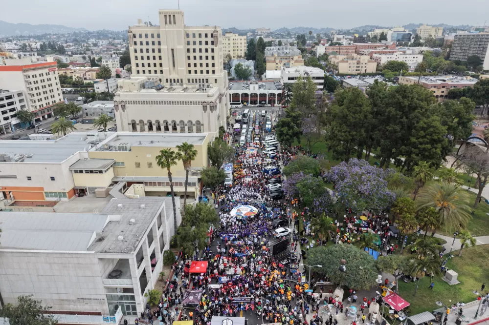 An aerial view shows a gathering of demonstrators during a May Day Rally Friday, May 1, 2026, in Los Angeles. (AP Photo/Jae C. Hong)