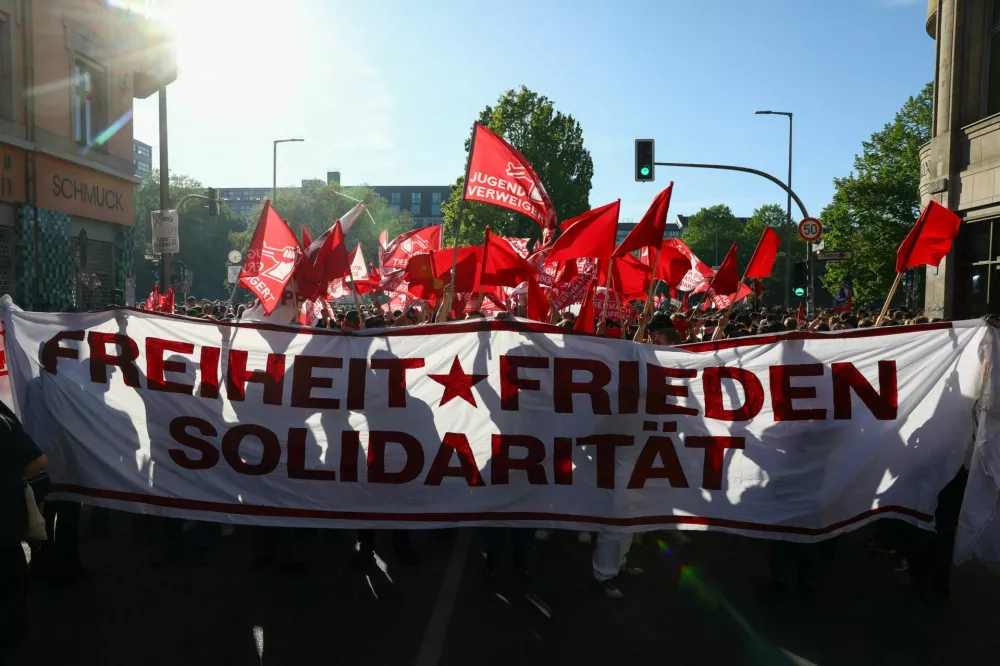 Demonstrators take part in a "Revolutionary 1. Mai" protest to commemorate May Day in Berlin, Germany, May 1, 2026. REUTERS/Christian Mang