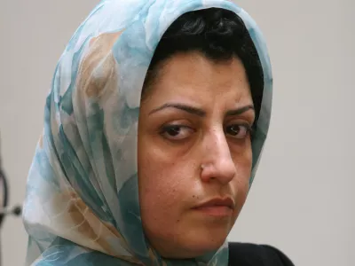 FILE - Prominent Iranian human rights activist Narges Mohammadi attends a meeting on women's rights in Tehran, Iran, Aug. 27, 2007. (AP Photo/Vahid Salemi, File)
