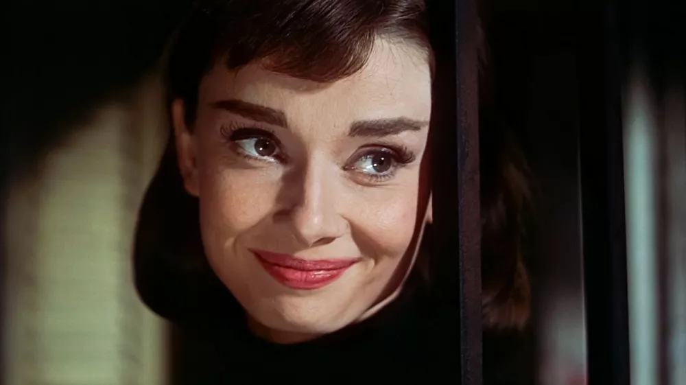 USA. Audrey Hepburn in a scene from the (C)Paramount Picture film: Funny Face (1957). Plot: An impromptu fashion shoot at a book store brings about a new fashion model discovery in the shop clerk.Ref: LMK110-J7814-270122Supplied by LMKMEDIA. Editorial Only.Landmark Media is not the copyright owner of these Film or TV stills but provides a service only for recognised Media outlets. pictures@lmkmedia.com,Image: 658229507, License: Rights-managed, Restrictions: Supplied by Landmark Media. Editorial Only. Landmark Media is not the copyright owner of these Film or TV stills but provides a service only for recognised Media outlets. Per la presente foto non &egrave; stata rilasciata liberatoria. Ai sensi di legge e come gi, Model Release: no
