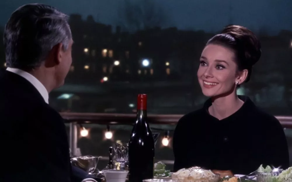 USA. Cary Grant and Audrey Hepburn in a scene from the (C)Universal Pictures film: Charade (1963). Plot: Romance and suspense ensue in Paris as a woman is pursued by several men who want a fortune her murdered husband had stolen. Whom can she trust?,Image: 658220896, License: Rights-managed, Restrictions: Supplied by Landmark Media. Editorial Only. Landmark Media is not the copyright owner of these Film or TV stills but provides a service only for recognised Media outlets., ***HANDOUT image or SOCIAL MEDIA IMAGE or FILMSTILL for EDITORIAL USE ONLY! * Please note: Fees charged by Profimedia are for the Profimedia's services only, and do not, nor are they intended to, convey to the user any ownership of Copyright or License in the material. Profimedia does not claim any ownership including but not limited to Copyright or License in the attached material. By publishing this material you (the user) expressly agree to indemnify and to hold Profimedia and its directors, shareholders and employees harmless from any loss, claims, damages, demands, expenses (including legal fees), or any causes of action or allegation against Profimedia arising out of or connected in any way with publication of the material. Profimedia does not claim any copyright or license in the attached materials. Any downloading fees charged by Profimedia are for Profimedia's services only. * Handling Fee Only ***, Model Release: no