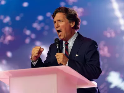 Tucker Carlson speaks during AmericaFest, the first Turning Point USA summit since the death of Charlie Kirk, in Phoenix, Arizona, U.S. December 18, 2025. REUTERS/Cheney Orr