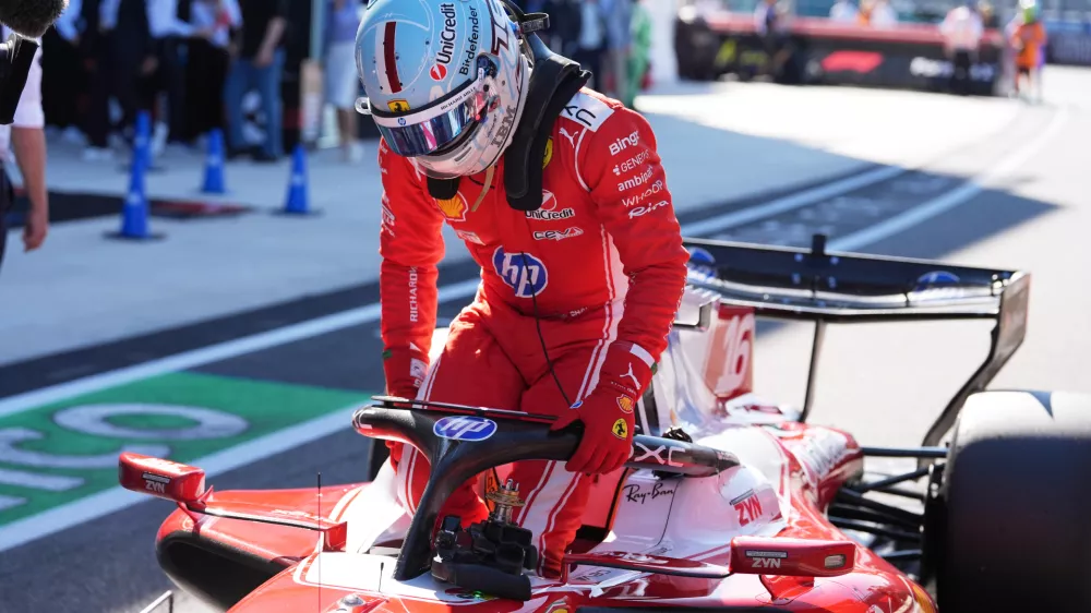 Ferrari driver Charles Leclerc of Monaco exits his car after a qualifying session for the Miami Formula One Grand Prix auto race, Saturday, May 2, 2026, in Miami Gardens, Fla. (AP Photo/Rebecca Blackwell)