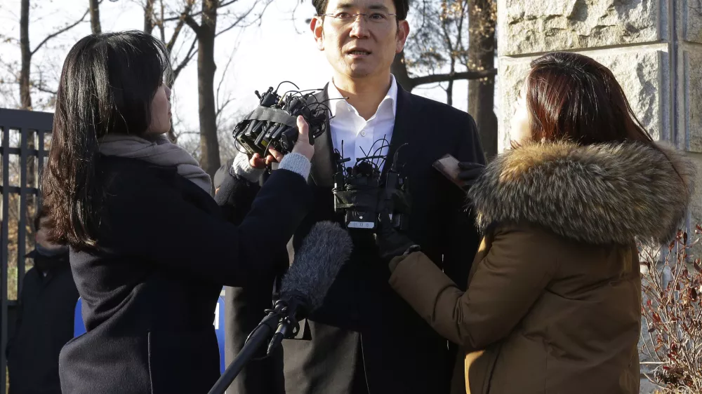 Lee Jae-yong, vice chairman of Samsung Electronics, speaks before leaving a detention center in Uiwang, South Korea, Monday, Feb. 5, 2018. A South Korean appeals court Monday handed down a 2 &Acirc;˝-year suspended jail sentence for corruption to Samsung heir Lee, clearing the way for him to be freed after nearly a year in prison and return to the company's leadership. (AP Photo/Ahn Young-joon)