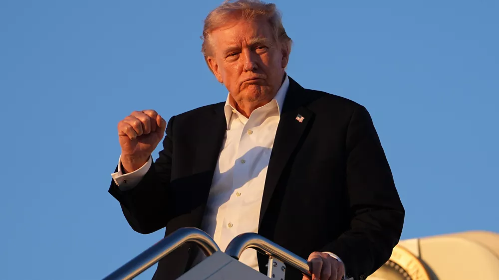 President Donald Trump arrives on Air Force One at Joint Base Andrews, Md., Sunday, May 3, 2026. (AP Photo/Matt Rourke)