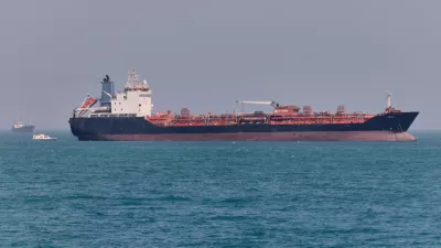 An oil tanker sits at anchor in the Strait of Hormuz off Bandar Abbas, Iran, Saturday, May 2, 2026.(Amirhosein Khorgooi/ISNA via AP)