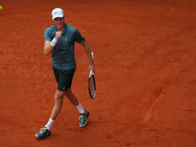 Jannik Sinner, of Italy, celebrates after winning the men's singles tennis final match against Alexander Zverev, of Germany, at the Madrid Open tennis tournament in Madrid, Spain, Sunday, May 3, 2026. (AP Photo/Manu Fernandez)