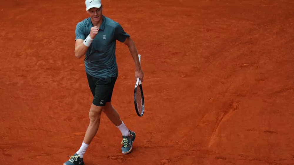 Jannik Sinner, of Italy, celebrates after winning the men's singles tennis final match against Alexander Zverev, of Germany, at the Madrid Open tennis tournament in Madrid, Spain, Sunday, May 3, 2026. (AP Photo/Manu Fernandez)