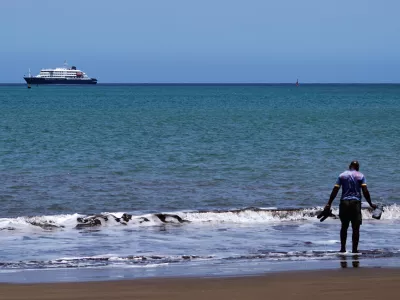 The MV Hondius cruise ship is anchored at a port in Praia, Cape Verde, Monday, May 4, 2026. (AP Photo/Arilson Almeida)