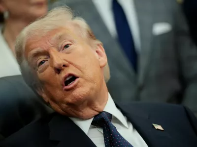 U.S. President Donald Trump speaks during an event to sign a memorandum in the Oval Office at the White House in Washington, D.C., U.S., May 5, 2026. REUTERS/Evan Vucci