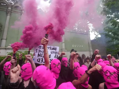 Pussy Riot and FEMEN activists stage a protest against Russia's presence after its absence following the 2022 invasion of Ukraine in front of the Russian pavilion, at the 2026 Art Venice Biennale, in Venice, Italy, Wednesday, May 6, 2026. (AP Photo/Luca Bruno)