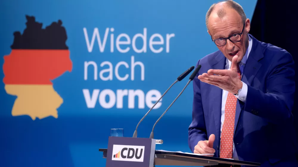 FILED - 19 January 2025, North Rhine-Westphalia, Brilon: Christian Democratic Union of Germany (CDU) chancellor candidate Friedrich Merz speaks at the Weisswurst breakfast in the Schuetzenhalle. He met withChristian Social Union in Bavaria(CSU) leader Markus Soeder for a Weisswurst breakfast, an old Bavarian tradition, to talk to each other. Photo: Oliver Berg/dpa