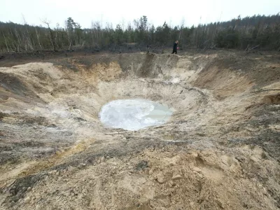 February 15, 2024, Kyiv Region, Ukraine: KYIV REGION, UKRAINE - FEBRUARY 15, 2024 - The crater left by the explosion of a downed Russian missile is pictured in Kyiv region, northern Ukraine. Early on February 15, Russia launched a massive missile attack on Ukraine. Ukrainian air defences intercepted 13 out of 26 missiles.,Image: 847123222, License: Rights-managed, Restrictions:, Model Release: no