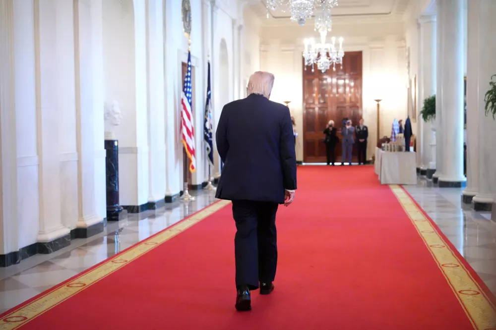 President Donald Trump leaves after an event with small business owners, Monday, May 4, 2026, in the East Room at the White House in Washington. (AP Photo/Mark Schiefelbein)