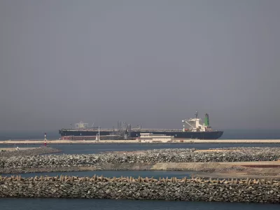 A cargo ship docked at the Port of Fujairah, as the U.S.-Israel conflict with Iran limits marine traffic in the Strait of Hormuz, in Fujairah, United Arab Emirates, May 6, 2026. REUTERS/Amr Alfiky