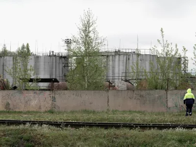 Oil tanks at the site where drones crashed at a storage facility in Rezekne, Latvia, May 7, 2026. REUTERS/Janis Laizans
