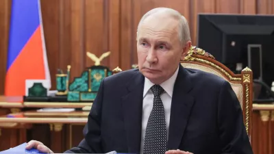 Russian President Vladimir Putin listens to the governor of Tambov region Evgeny Pervyshov at the Kremlin in Moscow, Wednesday, May 6, 2026. (Mikhail Metzel, Sputnik, Kremlin Pool Photo via AP)