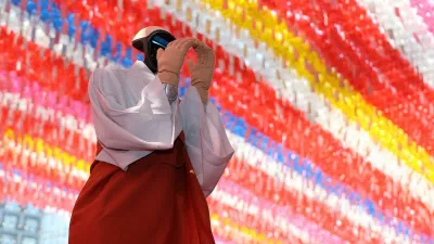 Humanoid robot Gabi folds its hands during a precept ceremony at a temple in Seoul, South Korea, May 6, 2026.  Yonhap via REUTERS  THIS IMAGE HAS BEEN SUPPLIED BY A THIRD PARTY. NO RESALES. NO ARCHIVES. SOUTH KOREA OUT. NO COMMERCIAL OR EDITORIAL SALES IN SOUTH KOREA.