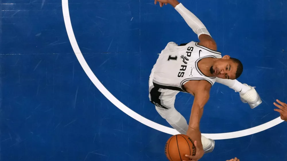 San Antonio Spurs forward Victor Wembanyama (1) grabs a rebound during the second half of Game 3 of a NBA basketball second-round playoff series against the Minnesota Timberwolves, Friday, May 8, 2026, in Minneapolis. (AP Photo/Abbie Parr)
