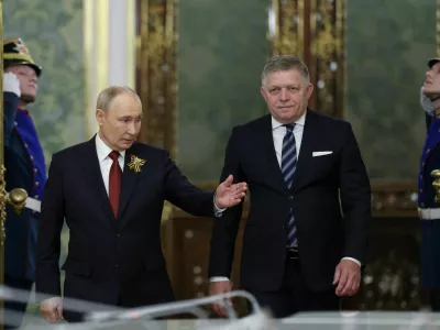 Russian President Vladimir Putin shows the way to Slovak Prime Minister Robert Fico during a meeting in Moscow, Russia May 9, 2026. REUTERS/Ramil Sitdikov/Pool   TPX IMAGES OF THE DAY