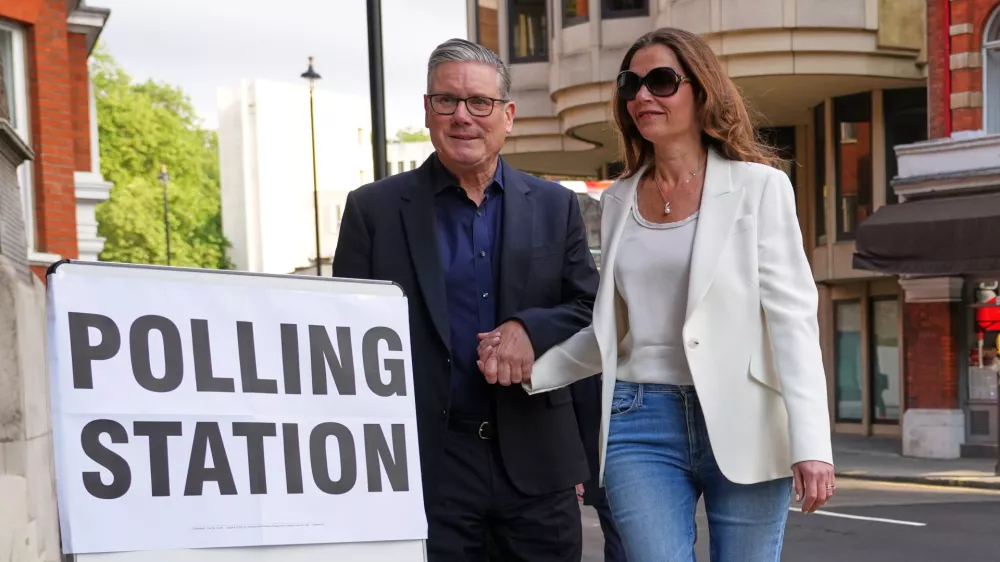 Britain's Prime Minister Keir Starmer and wife Victoria arrive at a polling station in central London, Thursday, May 7, 2026 to cast their votes in the local elections.(AP Photo/Kirsty Wigglesworth)