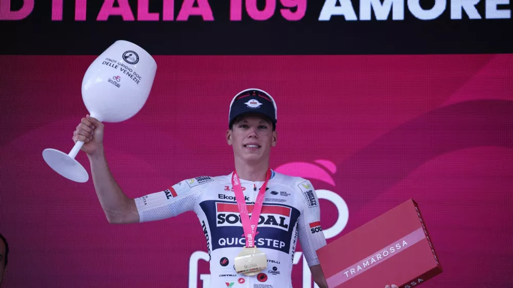 Cycling - Giro d'Italia - Stage 3 - Plovdiv to Sofia - Bulgaria - May 10, 2026 Soudal Quick Step's Paul Magnier celebrates on podium after winning stage 3 REUTERS/Spasiyana Sergieva