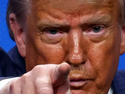 FILE PHOTO: U.S. President Donald Trump gestures during a press conference at a NATO summit in The Hague, Netherlands June 25, 2025. REUTERS/Yves Herman/File Photo