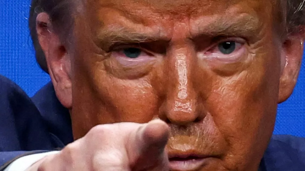 FILE PHOTO: U.S. President Donald Trump gestures during a press conference at a NATO summit in The Hague, Netherlands June 25, 2025. REUTERS/Yves Herman/File Photo