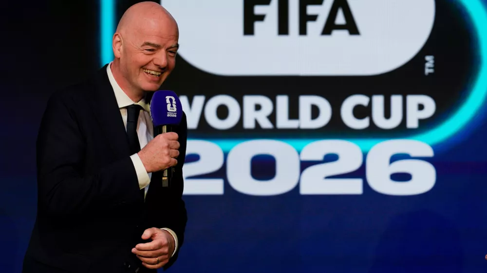 FILE - FIFA President Gianni Infantino speaks during the match schedule reveal for the 2026 soccer World Cup in Washington, Saturday, Dec. 6, 2025. (AP Photo/Chris Carlson, File)