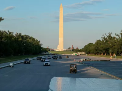 FILE PHOTO: U.S. President Donald Trump's motorcade drives on the Lincoln Memorial Reflecting Pool as it undergoes renovations, with the Washington Monument and U.S. Capitol building in the background, in Washington, D.C., U.S., May 7, 2026. REUTERS/Kylie Cooper/File Photo