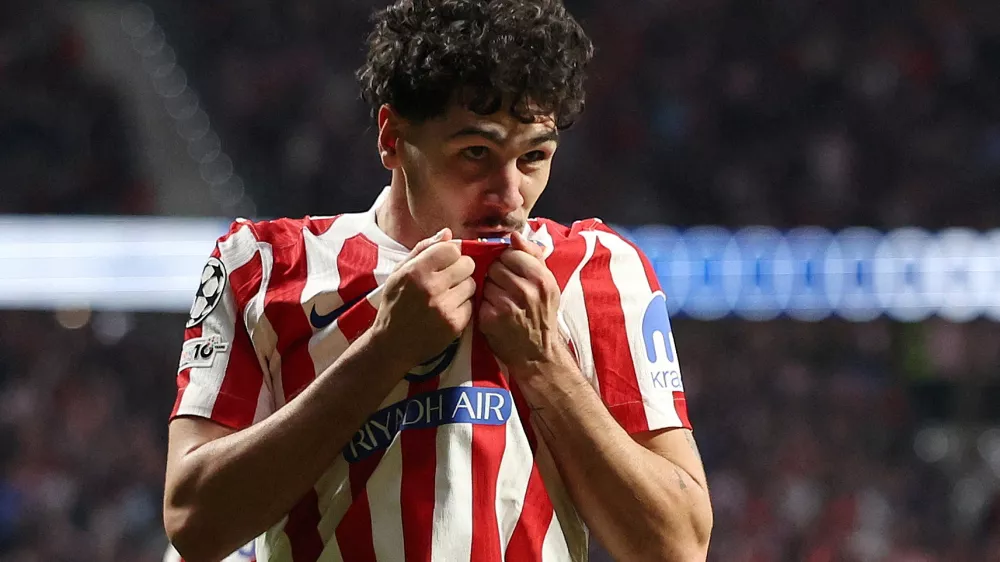 FILE PHOTO: Soccer Football - UEFA Champions League - Play Off - Second Leg - Atletico Madrid v Club Brugge - Riyadh Air Metropolitano, Madrid, Spain - February 24, 2026 Atletico Madrid's Johnny Cardoso celebrates scoring their second goal REUTERS/Violeta Santos Moura/File Photo