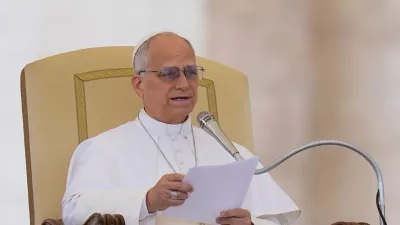 Pope Leo XIV delivers his speech during his weekly general audience in St. Peter's Square, at the Vatican, Wednesday, May 13, 2026. (AP Photo/Alessandra Tarantino)