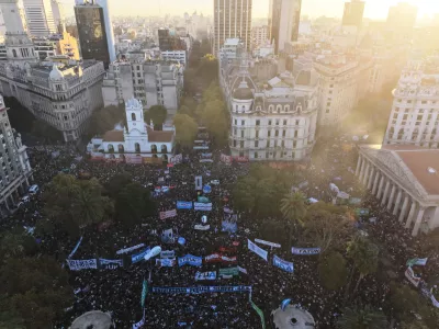 People protest to demand more fundings for public universities in Buenos Aires, Argentina, Tuesday, May 12, 2026. (AP Photo/Rodrigo Abd)